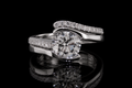 Round Brilliant Diamond Bypass Ring with Pavé Accents (eng460)