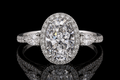 Oval Diamond Halo Ring with Pear Side Stones (eng469)